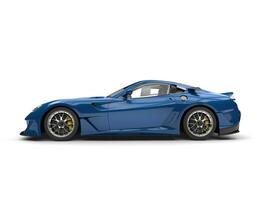Deep blue modern fast sports car - side view photo