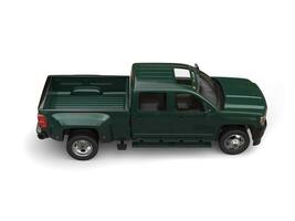 Dark green modern pickup truck - top down side view photo