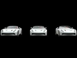 Cool three white sports cars - on black background photo