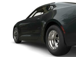 Dark grey modern fast car - rear wheel focus shot - 3D Illustration photo