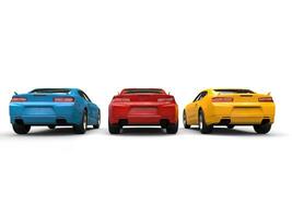 Red, blue and yellow modern fast cars - back view - 3D Illustration photo