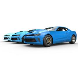Modern muscle cars - blue color variations - 3D Illustration photo