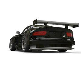 Sniny black modern fast supercar - back view - 3D Illustration photo