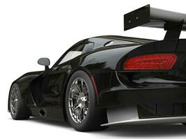 Awesome black supercar - taillight closeup shot - 3D Illustration photo