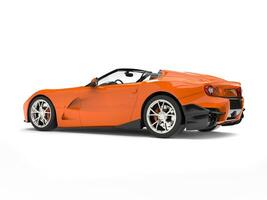 Fire orange modern convertible super sports car - back view studio shot photo