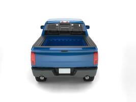 Dark blue modern pick up truck - back view photo