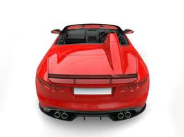 Modern fast crimson convertible super sports car - top back view photo