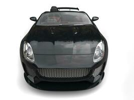 Night black fast convertible sports car - hood closeup shot photo