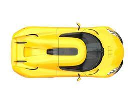 Super bright yellow sports car - top down view photo