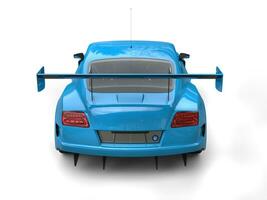 Brilliant blue modern sports car - back view photo