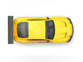 Brihgt yellow modern sport super car - top view photo