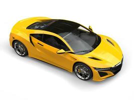 Bright sun yellow modern sports car - top down view photo