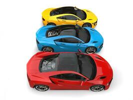 Super sports cars in primary colors - top down view photo