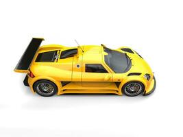 Lemon yellow modern super racing car - top down side view photo