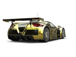 Beautiful golden supercar - tail view photo