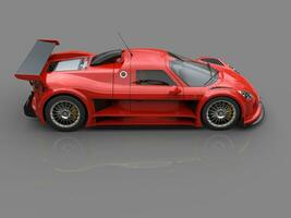 Racing supercar - scarlet red - showroom side view shot photo