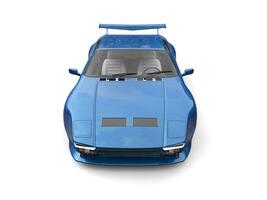Deep blue eighties sports car - front top down view photo