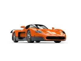 Orange concept race super car with black decals - studio shot photo