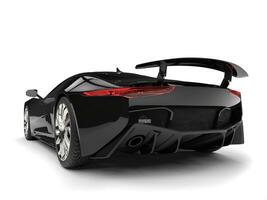 Jet black urban elegant sports car - back view photo