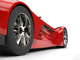 Persian red modern concept super car - rear wheel closeup shot photo