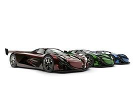 Metallic red, green and blue modern concept super cars in a row photo
