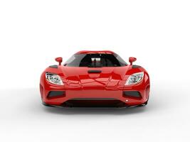 Beautiful scarlet red futuristic sports car - front view photo