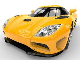 Deep yellow futuristic sport concept car - headlight extreme closeup shot photo