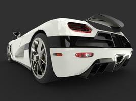 Futuristic super sports car - cosmic white paint - low angle back view shot photo