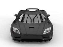 Awesome matte black super sports car - top front view photo