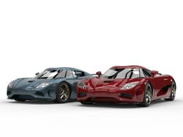 Cool concept sports cars in metallic cherry red and steel blue colors photo
