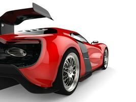 Rear wheel of red shiny modern sports concept car photo