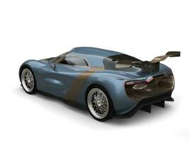 Metallic blue super car with light brown panels and detailing photo