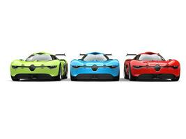 Concept sports cars in red, gree and blue colors - front view photo