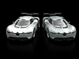 Modern super cars in variations of silver paint - front top view photo