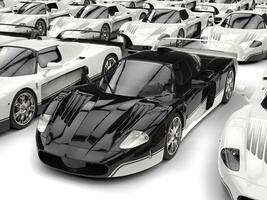 Black concept super car in a crowd of white cars photo