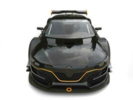 Awesome black super car with yellow details - front top view photo