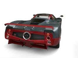 Amazing race car - slate gray and cherry red - back view photo