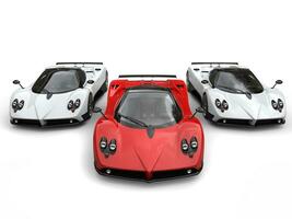 Modern super race cars - red and white side by side photo