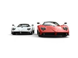 Super sports cars - spartan red and ghost white - front view photo