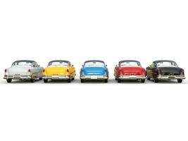 Magnificent vintage cars in different colors - back view photo