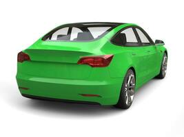 Guppie green modern electric car - back view photo
