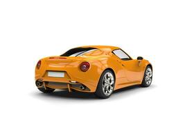 Fluorescent orange modern sports car - back view photo