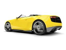 Bright yellow modern super sports car - tail view photo