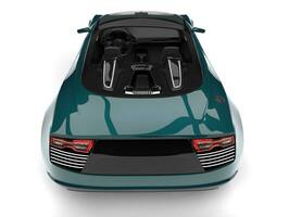 Deep jungle green modern cabriolet sports car - tail view photo