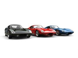 Amazing black, red and blue vintage sports cars photo