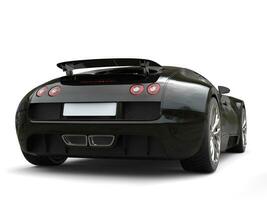 Modern jet black concept super car - back view photo