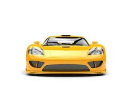 Beautiful yellow modern super race car - front view photo