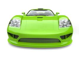 Glowing green modern super sports car - front view closeup shot photo