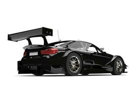 Shiny midnight black modern super race car - rear view photo