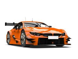 Tasty orange modern super race car - beauty shot photo